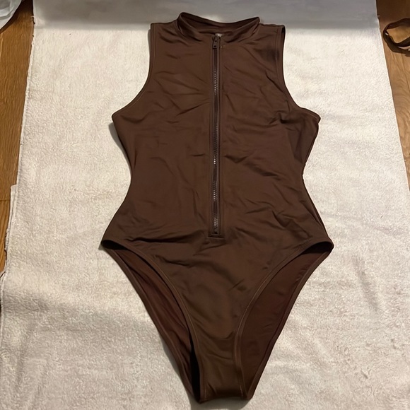 SKIMS Other - Skims swim Front Zip sleeveless One Piece
